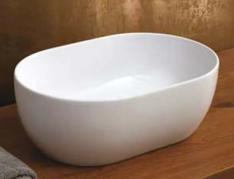 Lavabo in ceramica ovale 45x31 bianco lucido da appoggio senza troppieno codice prod: DSV17432 product photo